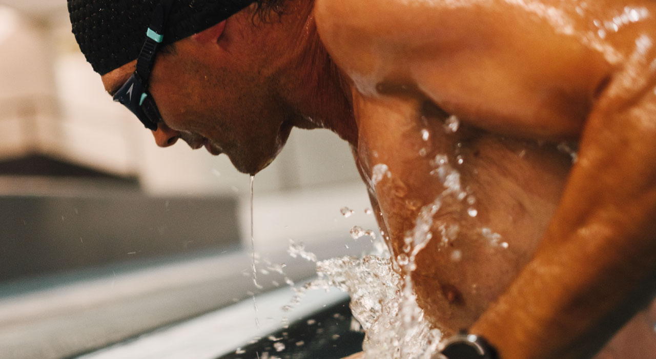 Holmes Place | man coming out of swimming pool